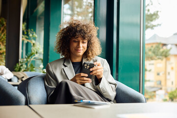 Businesswoman communicate via her phone