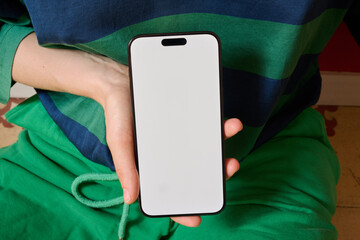 Holding a Smartphone With a Blank Screen