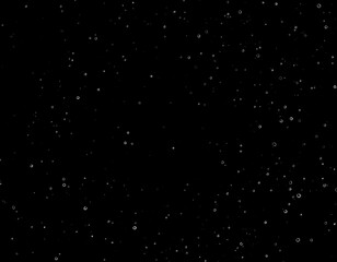 Obraz premium A dark night sky filled with tiny, scattered lights