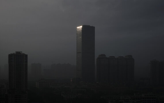 Refracted light high-rise buildings in the city in gloomy weather