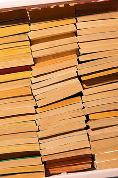 Graphic background with books stacked in a crate