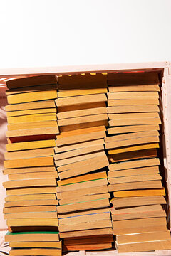 Graphic background with books stacked in a crate with white copy space