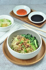 Chicken noodles with vegetables, an Indonesian delicious popular food called mie ayam