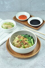 Chicken noodles with vegetables, an Indonesian delicious popular food called mie ayam