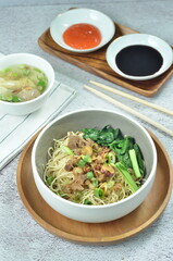 Chicken noodles with vegetables, an Indonesian delicious popular food called mie ayam