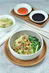 Chicken noodles with vegetables, an Indonesian delicious popular food called mie ayam