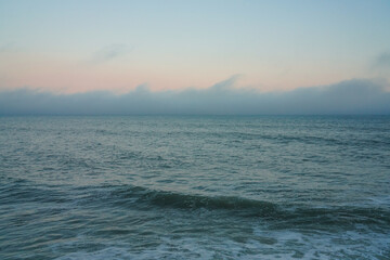 Obraz premium ocean waves and clouds