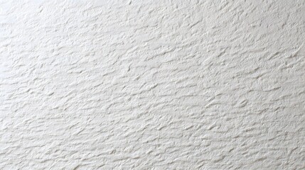 Smooth white wall with subtle texture imperfections, minimalistic and clean surface under even lighting.