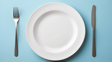 Empty plate with simple cutlery, signifying abstinence , restraint, diet, pure