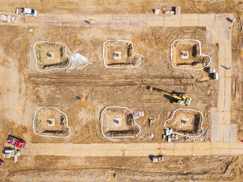 Aerial Construction Site Six House Foundations Progress