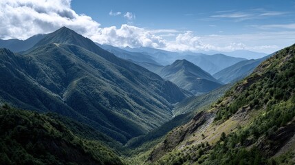 Fototapeta premium Lush mountain valley stretches beneath a vibrant sky.