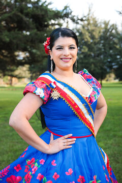 Chilean Cueca Champion Portrait in Traditional Floral Dress