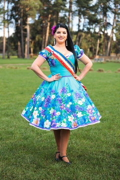 Female Cueca Winner in Floral Traditional Dress