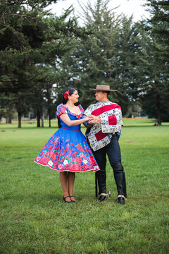 Traditional Chilean Dance Partners in Full Costume Outdoors