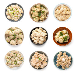 Set of bowls with tasty dumplings on white background, top view