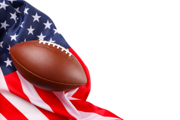 A football rests against a wrinkled American flag, isolated, PNG