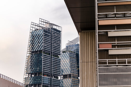 Tiled glass towers with exposed frames