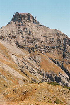 ugged Rocky Mountain Peak Under Clear Blue Sky