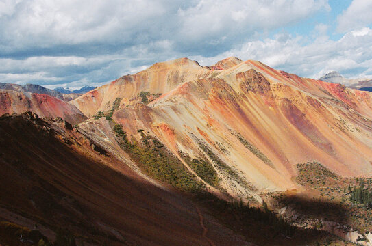 Colorful Layered Mountains With Red and Orange Strata