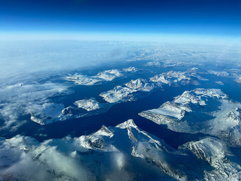 an aerial view of Greenland and it ice pack.