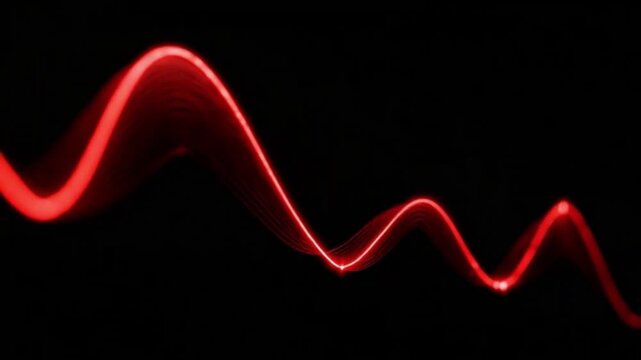 Red Waveform on Black: Captivating viewers with its mesmerizing design, a sinuous red waveform snakes across a dark backdrop, creating a stunning visual of energy.