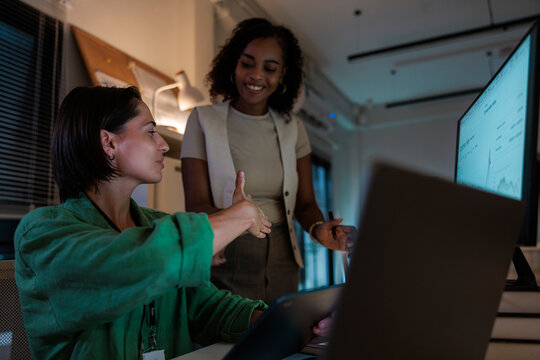 Two coworkers come to an agreement on a decision