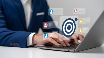 Businessman targets goals with data analytics on laptop computer screen