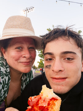 Mother join in Son Game Pizza