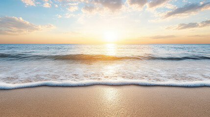 Obraz premium Golden sunset over calm ocean waves, reflecting light on sandy beach, creating serene atmosphere