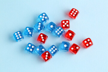 Different game dices on blue background