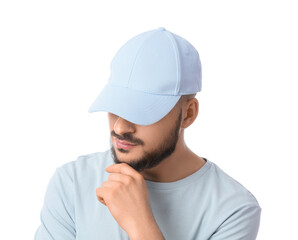 Handsome young man in stylish cap on white background