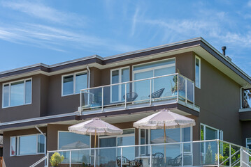 Top of luxury house with shingle roof and nice windows in Summer in Vancouver, Canada, North America. Day time on August 2025.