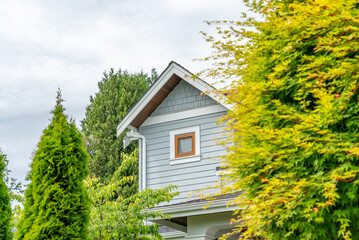 Top of luxury house with shingle roof and nice windows in Summer in Vancouver, Canada, North America. Day time on August 2025.