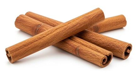 Several cinnamon sticks arranged together isolated on white background