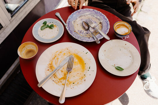 Overhead view of a table displaying empty dishes