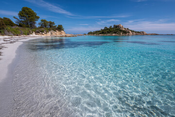 Fototapeta premium experience enchanting beach life of sardinia where turquoise waves gently kiss sunkissed sand