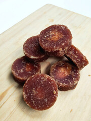 Detailed Close-Up of Brown Sugar on a Plank