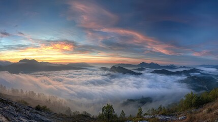 Sunrise panorama Mountaintop view, misty valley, colorful dawn sky. Travel postcard