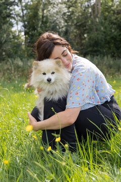 cuddling with dog