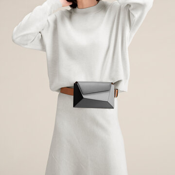 Minimalist Fashion Featuring a Stylish Belt Bag with Neutral Ton