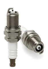 Two Spark Plugs Closeup on White Background, Engine Parts, Ignition System Components.