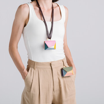 Minimalist Style Featuring Colorful Leather Accessories and Neut