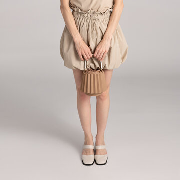 Stylish Beige Outfit With Chic Accessories and Elegant Footwear