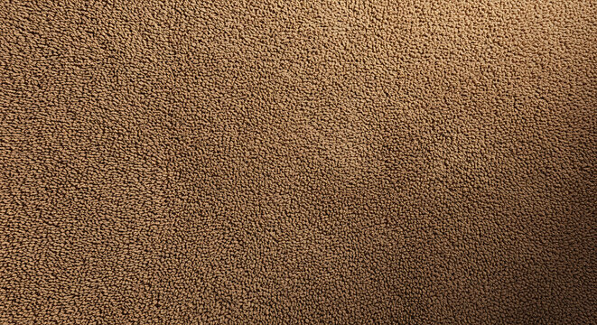 A close up shot of a brown textured fabric with a slightly darker gradient on the right side