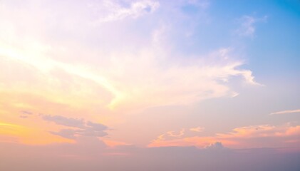 A vast, overcast sky filled with thick, gray clouds, casting a soft, diffused light over the landscape below, creating a moody, atmospheric scene.