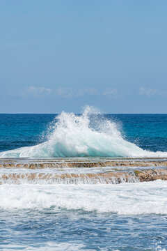 Vertical Caribbean Wave Explosion