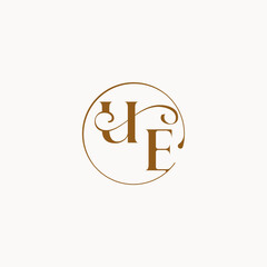 Obraz premium luxurius feeling with flow UE monogram elegant style letter circle fows wedding logo
