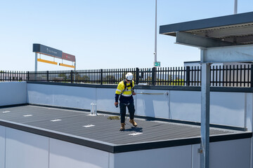 Hi Visibility Industrial Working At Heights