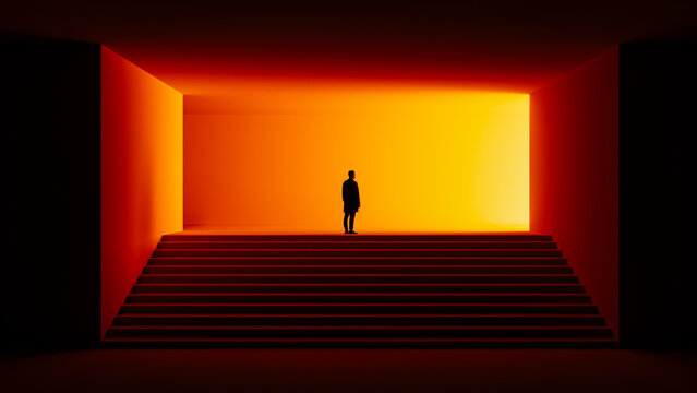 Man stands alone on stairs illuminated by dramatic light