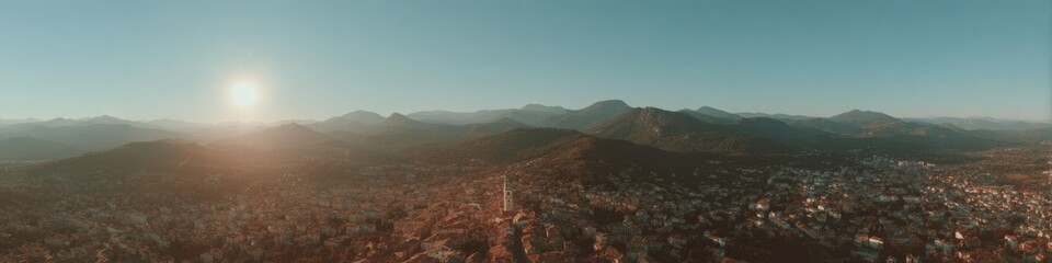Inspiring Skyscraper Day Drone View of Prades Cityscape Surrounded by Mountains with Bell Tower, Premium Modern Spring Travel and May Day Marketing Content